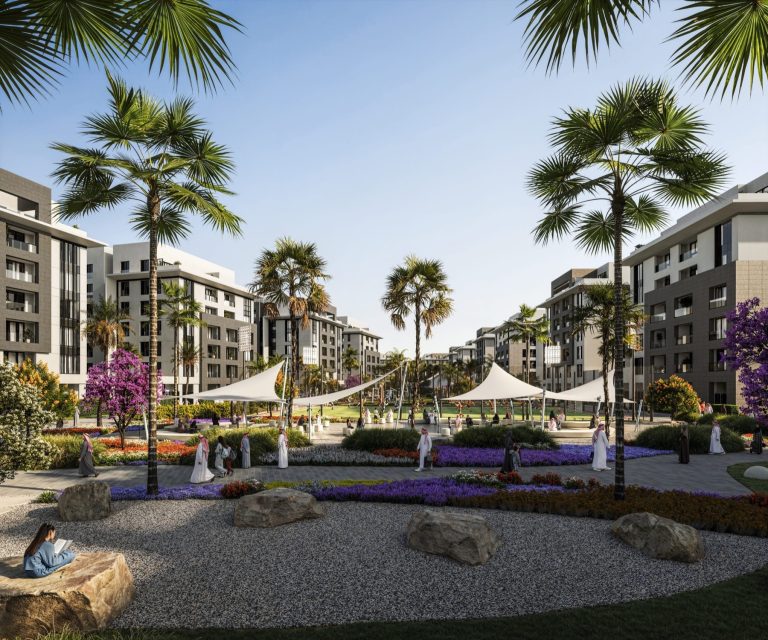 Landscaped courtyard gardens between the residential buildings at Al Alyaa