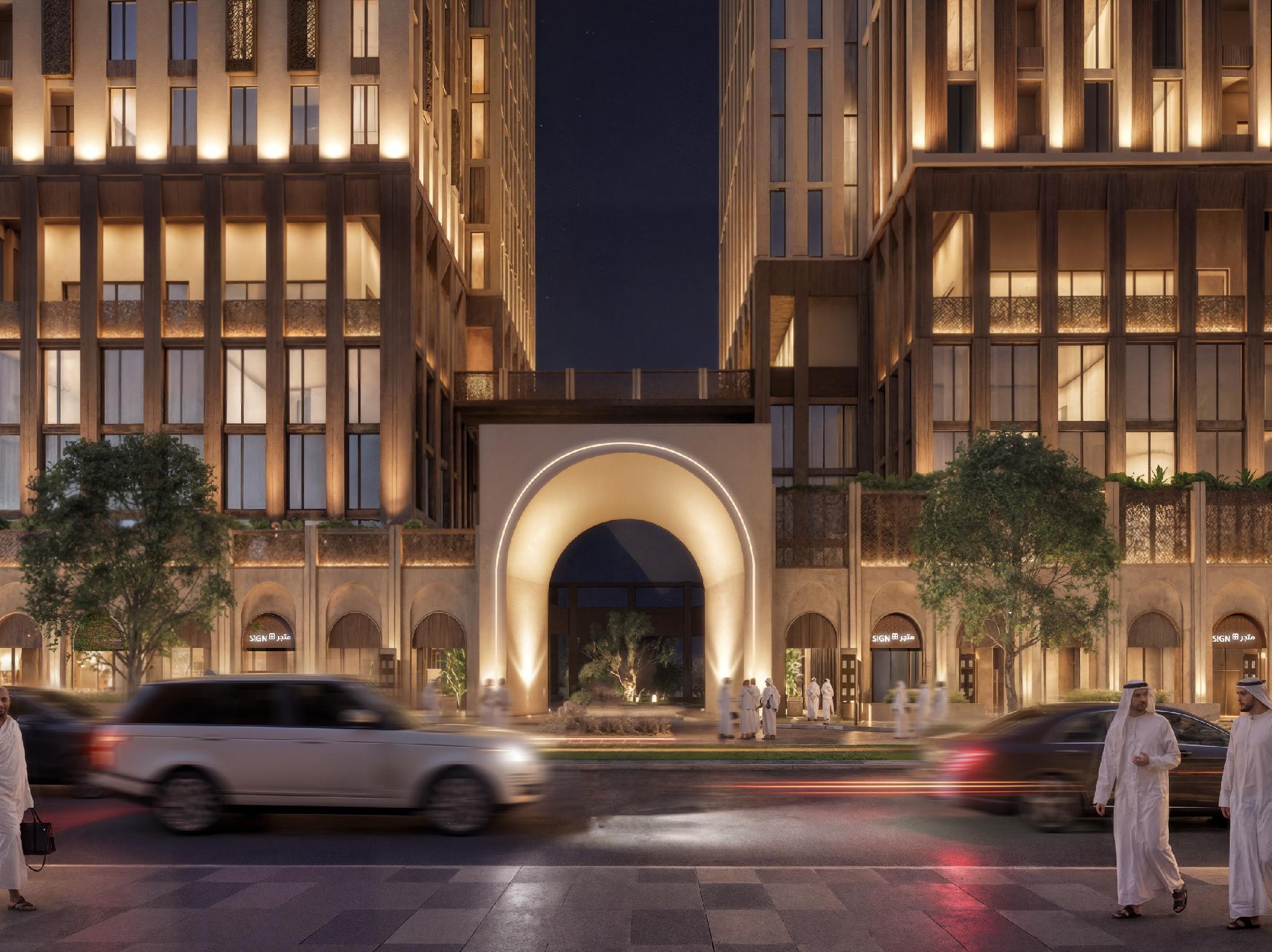 Masar Corner tower entrance and boulevard at dusk, Makkah