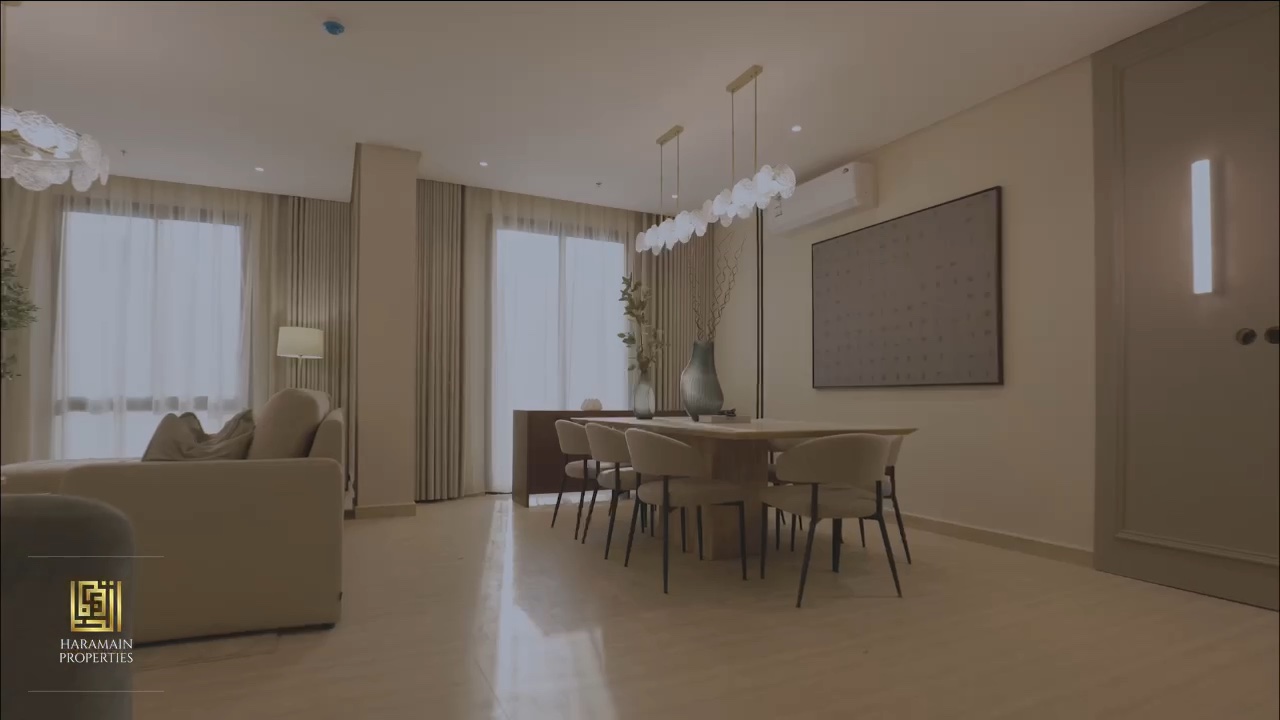 Living and dining area of the furnished Al Majdiah show apartment, Madinah